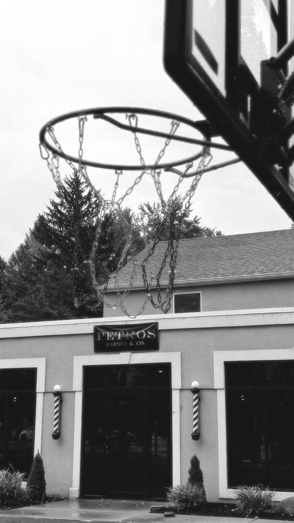 The exterior of Petros Barber & Co. on Sheridan Drive